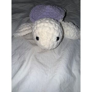 Hand crocheted‎ baby sea turtle white body and lilac purple shell.